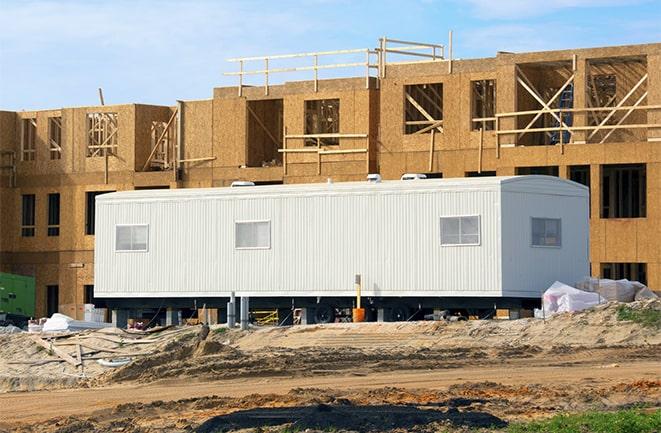 construction office rentals with signage for leasing information in Cudahy CA